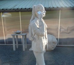 Betonskulpturen – Golfer